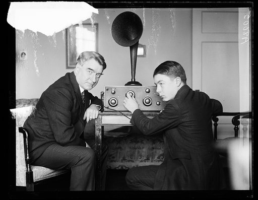 Sen. Royal S. Copeland and son Royal S., Jr., listening in at their apartment at Wardman Park Hotel