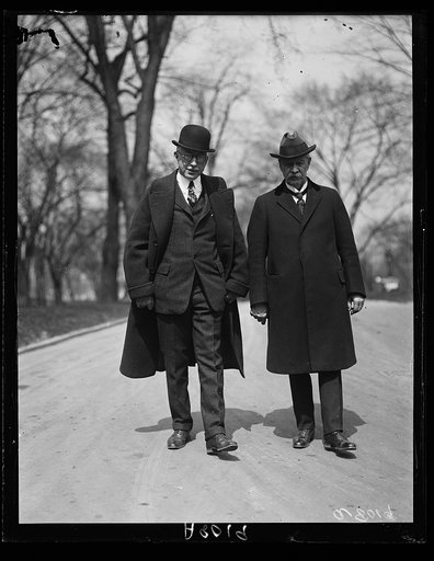 A.A. McGill (left) and D.K. Clink, officers of the Internat'l Federation of Commercial Travelers organizations who called at the White House today. They talked of traveling conditions with Pres. Coolidge