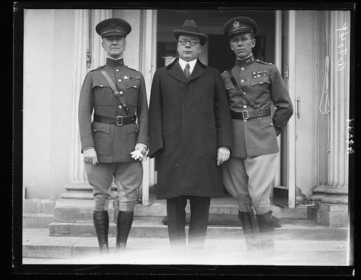 Asked Pres. Coolidge to speak at the dedication of the First Division Monument Oct. 4, 1924. Left to right: Brig. Gen. Frank Parker, Commander of the First Div., Col. James A. Drain, former Member of the 1st Div. staff, and Lt. Col. George C. Marshall, 1st Div. operations officer [White House, Washi