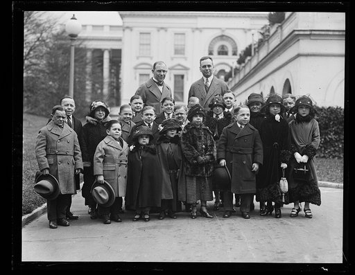 The entire company of the tiny men and women who compose the famous singer midgets were received by Pres. Coolidge April 7, Mr. Roland S. Robbins, Manager of B.F. Keith's Theatre accomplanied these little people to the White House. They have appeared in almost every country in the world