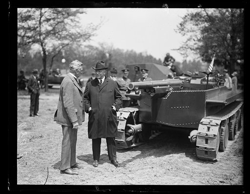 Edwin Denby? with military tank