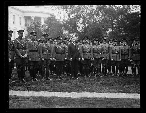 Calvin Coolidge and military outside White House, Washington, D.C.