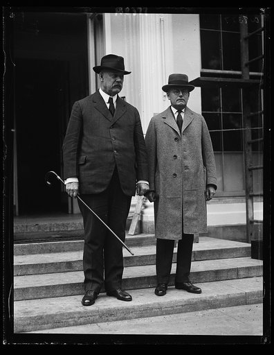 ...] to pay his respects to the Pres. was introduced by the Secy. of Weeks, who is also in the photo