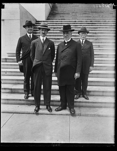 ...]ves and Dr. J [...]te, extreme right, greet [...]uga, left center, and Pastor [...] present the French Protestant [...]gian churches
