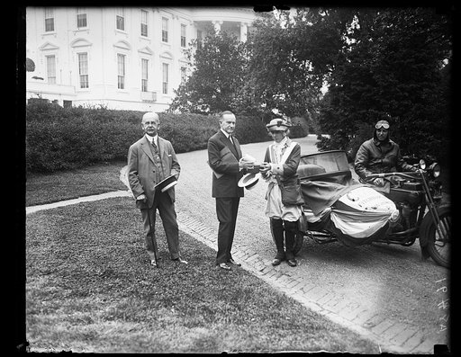 Rep. Calvin D. Paige introduces J. Fancis Mahoney, the minute man, and John B. Camacho, escot of Fitchburg, Mass., who brought on a motorcycle the signatures of 7000 members of the Calvin Coolidge Club of that city [White House, Washington, D.C.