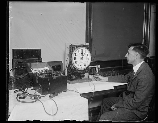 Setting the clocks hands by radio. U.S. Dunmore Bureau of Standards who adopted clock to radio control