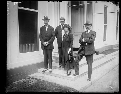 Lord Kenyon arrived in Wash. from Gambier, Ohio, where he attended the celebration of the founding of Kenyon [College?] 125 yrs ago. Lft. to rt.: Lord Kenyon, Albert Douglas, Former Member of Congress [...] Mrs. Kenyon Slaney and Col. Kenyon Slaney C.B.E.
