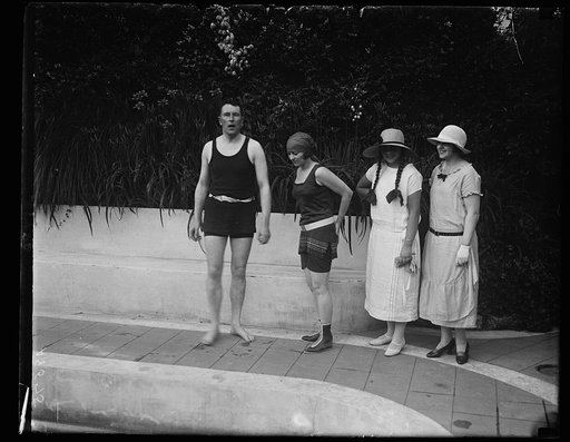 Mrs. Edgar Procknik, wife of the Charge d'Affaires of Austria, with her little daughter and Miss Romona Lefevre at Mrs. John B. Henderson's swimming pool