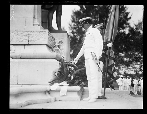 Capt. Andrews of "Mayflower" placing wreath on John Paul Jones statue
