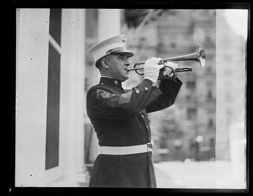 Arthur Whitcomb, U.S. Marine Corps bugler, will sound taps over the dead son of the Pres. at the grave in Plymouth, Vt. He sounded taps when Woodrow Wilson was laid to rest in the crypt of the Nat'l Cathedral some months ago
