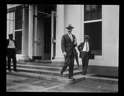 J. Butler Wright, third Asst. Secy. of State, arriving at the W.H. [i.e., White House] with letters of condolence for the Pres. from the State Dept. on the death of Calvin Coolidge, Jr.