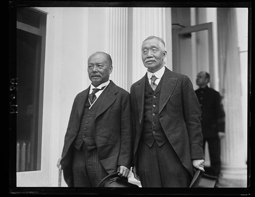 Mr. Liang Shih-Yi (lft.) and Mr. Yung Kwai Charge D'Affaires of the Chinese Legation in Wash. snapped at White House