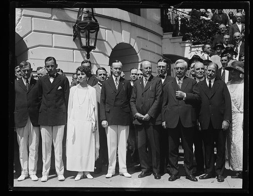 Grace and Calvin Coolidge and group outside White House, Washington, D.C.