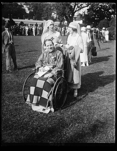 American Red Cross and person in wheelchair at White House, Washington, D.C.