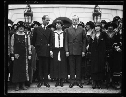 Grace Coolidge and Calvin Coolidge with group outside White House, Washington, D.C.