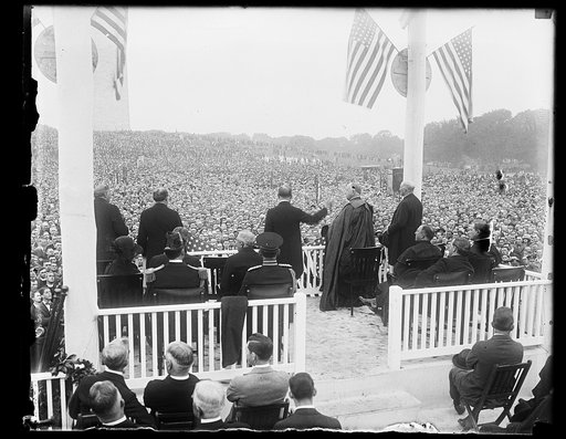 Stage and crowd; Washington Monument in background, Washington, D.C.