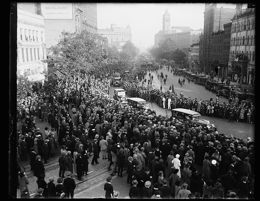 Crowds and motorcade on Pennsylvania Avenue, Washington, D.C.