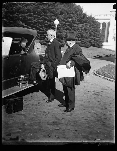 C. Bascom Slemp, Secy. to the Pres. with [...] Series game, Oct. 8th, from a portable radio installed in the car of one of the photographers at the White House