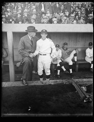 Gov. Pinchot of Pa. congratulating "Bucky" Harris, the young mgr. of the Was. team, just before the 6th game of the series