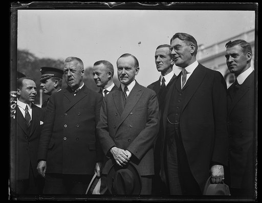Calvin Coolidge, Curtis D. Wilbur and group outside White House, Washington, D.C.