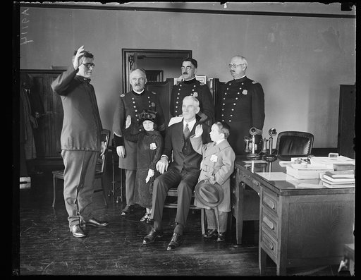 Police; with children "officers" taking oath