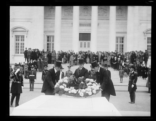 Dwight Davis, Calvin Coolidge, and Curtis D. Wilbur laying wreath on Tomb of Unknown Soldier, Arlington National Cemetery, Arlington, Virginia