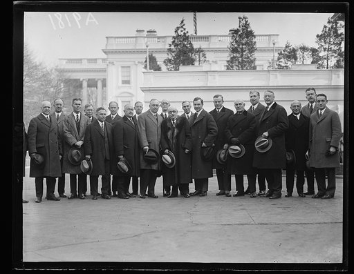 Members of Executive Committee of the American Banker's Assoc. who conferred with Pres. Coolidge on financial matters Dec. 11. William E. Knox, Pres. of the A.B.A. is standing center [White House, Washington, D.C.