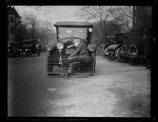 Picks him up at 25 miles an hour! If the modern auto or truck hits you don't worry. Equipped with this device you are simply given a free ride. This man even came from behind another car, was struck but not even scratched. The demonstration was given recently in Washington, D.C.
