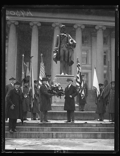 Secy. of Treasury Mellon laying wreath on statue of Alex. Hamilton in behalf of Sons of the Amer. Revolution, Jan. 10, in commemoration of the 1st Treasury Secy.'s 168th birthday