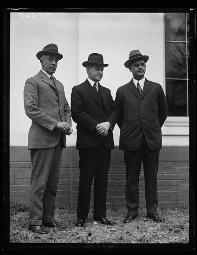 Left to right: C. Bascom Slemp, Pres. Coolidge, and Cong. Everett Sanders, successor to Slemp as secretary to Pres. Coolidge. White House, Washington, D.C.