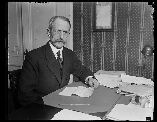 This is the first picture to be made of the newly appointed French Ambassador to the United States, Emileux Daeschner, at his desk in the French Embassy, Washington. He succeeds the former Dean of the Diplomatic Corps, Jules Jusserand. The picture was made, Jan. 26