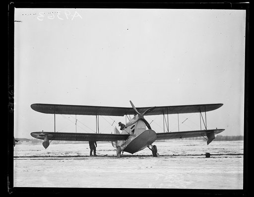The new amphibian airplane, that is a [...] water and land was inspected by a Congressional com[...] Bolling Field, Monday, January 19. The machine was [...] Grover Loenig, of New York. Left [...