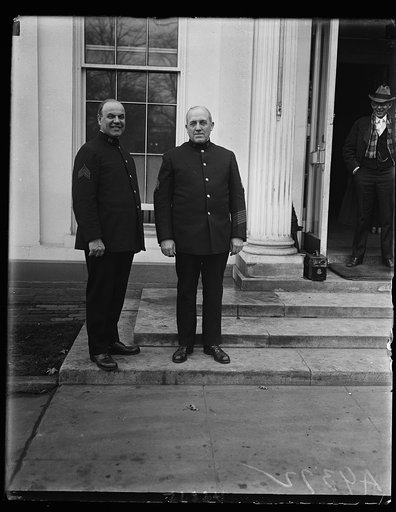 The president's official greeters. These two gentlemen, Sergt. Ernest M. Seaman, (left) and Sergt. C.L. Dalrymple, of the White House police force, are the president's official greeters. These are the men who must first talk to each an every one of the 10,000 visitors [...] call at the White House e
