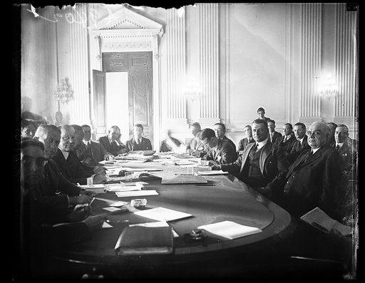 Brig. Gen. William Mitchell, Assistant Chief of the Air Service testifying before the House Aircraft Committee a[...] Capitol. On the general's left is Rep. Florian Lampert, Cahir[...] the committee. Gen. Mitchell said he was convinced the syst[...] of aircraft management in the United States "is de