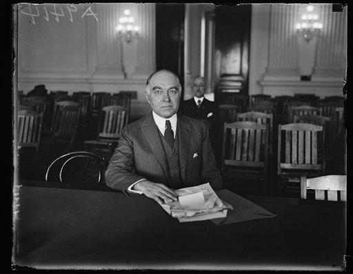 In spotlight at House Aircraft Hearing. Rear Admiral Shoemaker, Chief of the Bureau of Navigation, U.S. Navy as he appeared before the House Special Aircraft Committee on February, 14th. Admiral Shoemaker absolutely denied the charges that he "bluepenciled" a statement to be issued under General Per