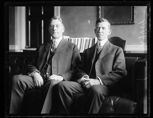 Curtis D. Wilbur, left