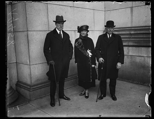 Charles Evans Hughes, left; Frank Kellogg, right