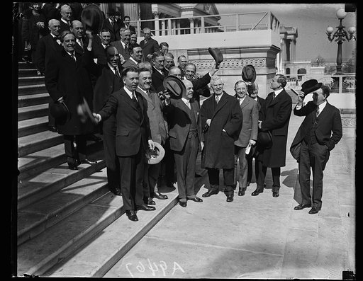 Group on steps of U.S. Capitol; Nicholas Longworth, center, front. Washington, D.C.