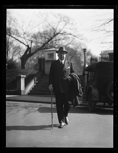 Man outside White House gate, Washington, D.C.