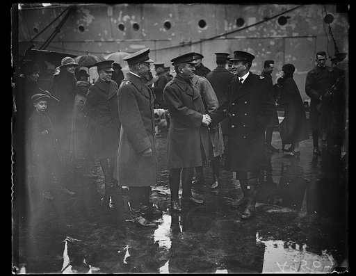 Military group near ship