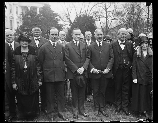 Members of the Gen. Council of Presbyterian Churches call on Pres. Coolidge, March 18th. On the left of the Pres. is Dr. C.E. Macartney, Pres. General Assembly of [Presbyterian?] Churches and on his right is Dr. L.S. Mudge, Secy. of the [...] organization [White House, Washington, D.C.