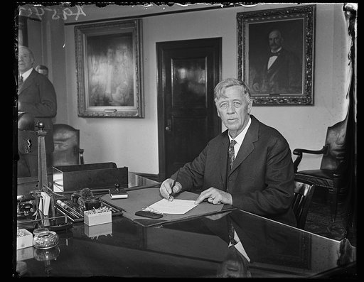 John G. Sargent at desk