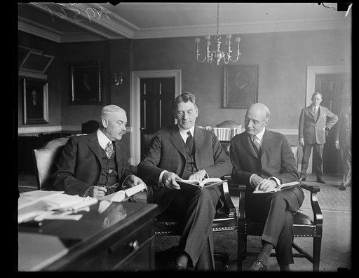 Curtis D. Wilbur, center