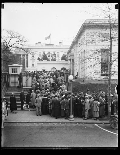 Pres. Coolidge greets an average of 1000 tourists a day at the White House. April 15