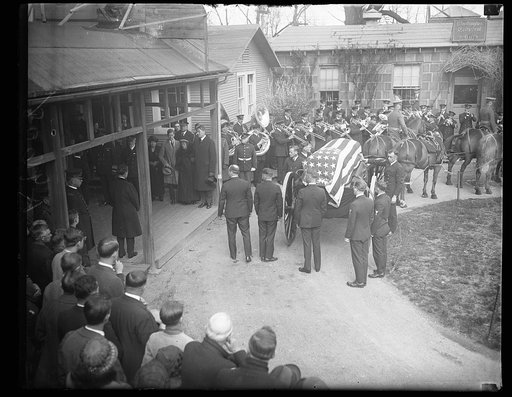 Casket on wagon next to Washington Cathedral offices. Washington, D.C.