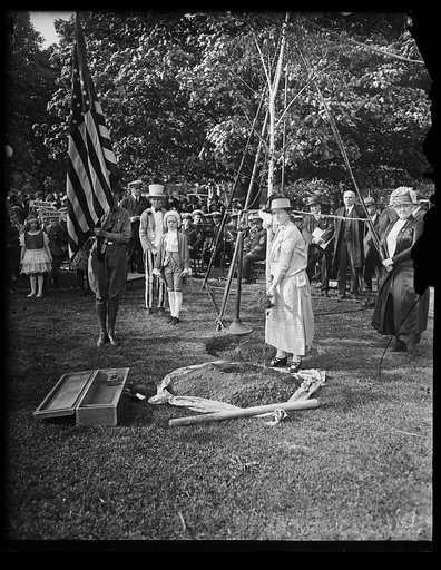 Tree planting ceremony to commemorate Mother's Day, with Raymond Thompson costumed as George Washington, and school girls costumed as state flowers, on grounds of U.S. Capitol, Washington, D.C.