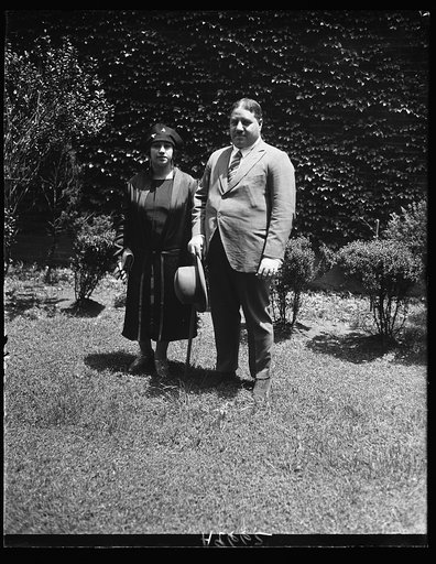 The new Egyptian envoy and his wife arrive in Washington. Mahmoud Samy Pasha and his wife snapped at the Legation, 1815 Q St., shortly after their arrival in Washington. They landed in New York June 30th on the liner Majestic