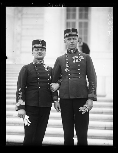 Two interesting members of the International Association [...] Police Chiefs who are visiting in Washington. George Pushkas, [...] chief of the Royal Hungarian State Police and Dr. John [...]rt, Captain of Hungarian police