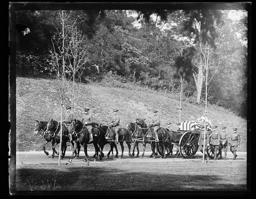 Casket transported by wagon