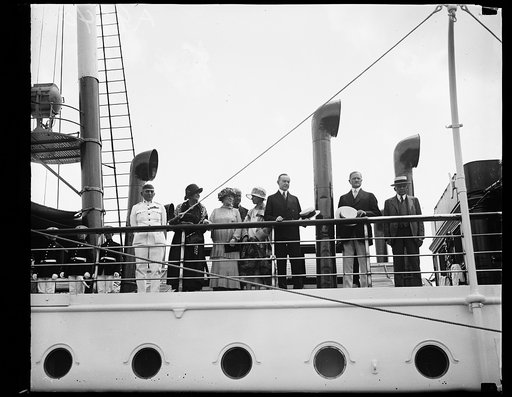 Ship: left to right from center: Grace Coolidge, Calvin Coolidge, John J. Pershing, and Frank Kellogg at right